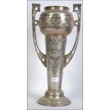 A stunning large silver plate WMF twin handled vase of Art Nouveau form,