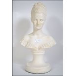 A 20th century classical bust of a young lady raised on a socle base H38cm