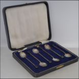 A cased set of six Walker and Hall silver hallmarked coffee bean spoons,
