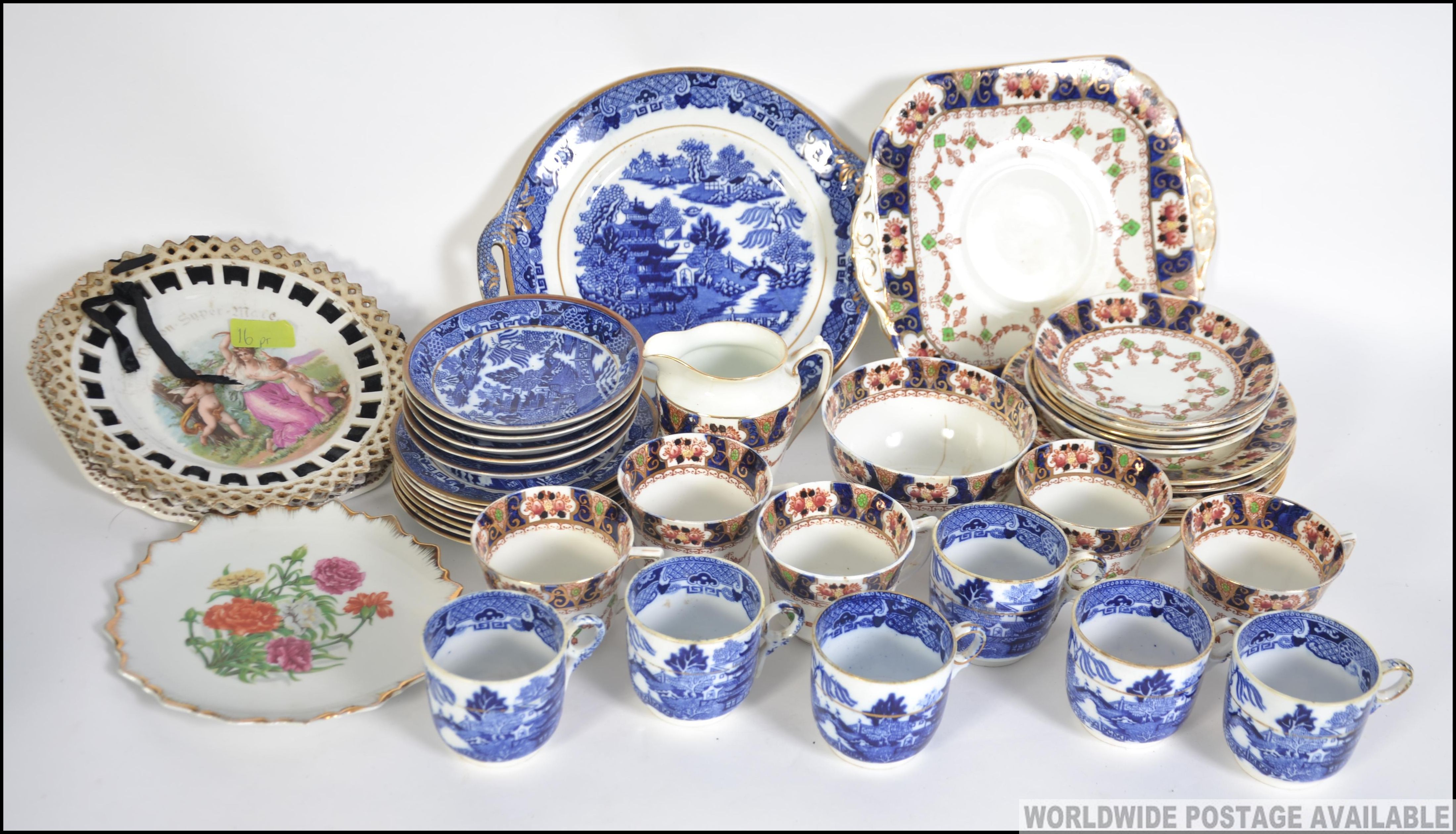 A Staffordshire part service with Imari pattern .