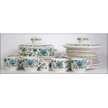 A retro part service of Midwinter ' Spanish Garden ' to include dinner plates, side plates,