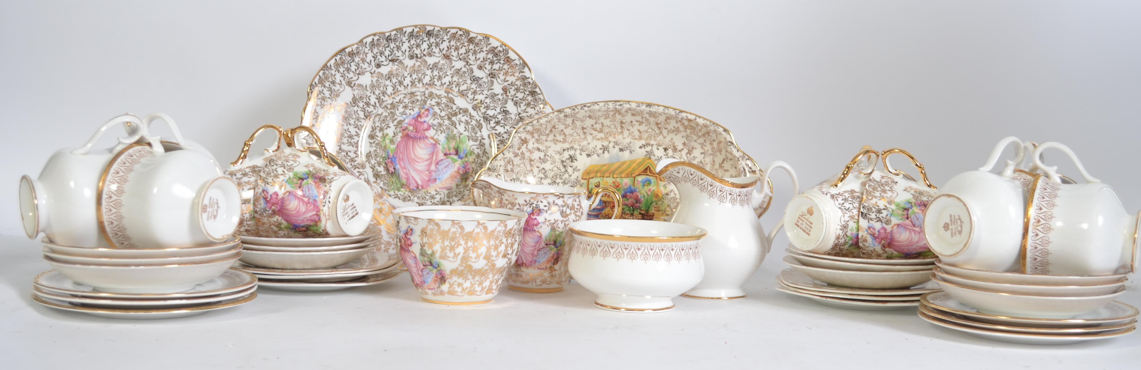 A Royal Albert China tea service in the Burlington pattern consisting of cups, saucers, side plates,