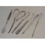 A silver hallmarked manicure set to include scissors,