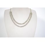 A good vintage white metal rhinestone prom necklace set with clear rhinestones joining marquise
