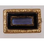 A Victorian mourning brooch with black e
