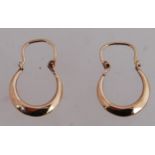 A pair of 9ct gold creole earrings with