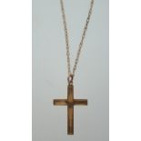 A 9ct gold crucifix - cross pendant and