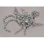 A very large 1950s rhinestone spray brooch in a silver tone setting with a roll over clasp,