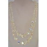 A large 1950s aurora crystal bead double strand necklace with a rhinestone box clasp.