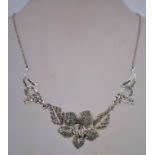 A 1950s marcasite necklace in silver tone metal with a bolt ring clasp. Measuring 40cms long.