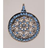 A 1920s to 1930s rhinestone pendant, in silver plated brass with pale blue rhinestones,