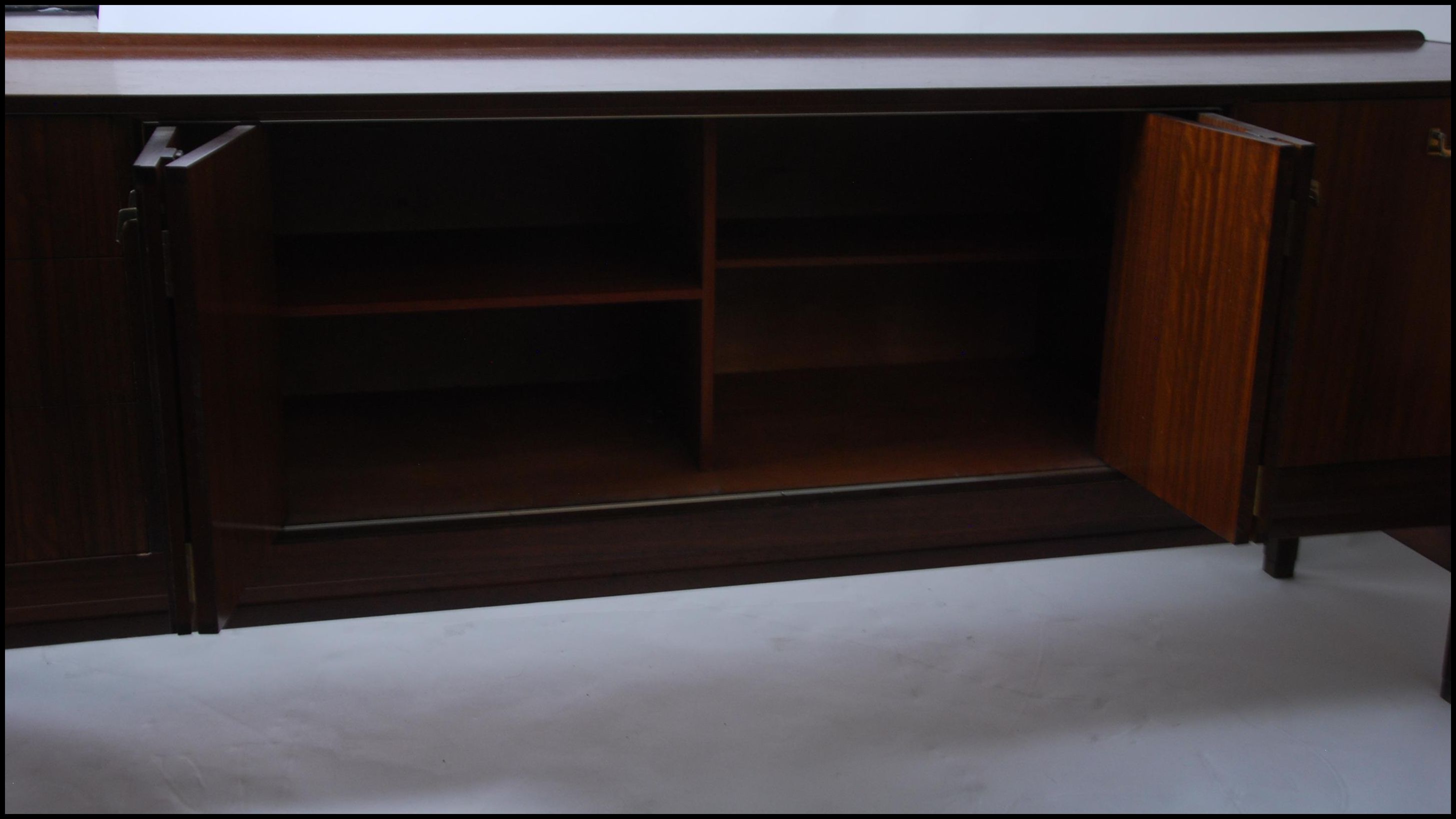 A 1970's low and long teak wood sideboard by G-Plan. - Image 6 of 7