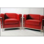 After Le Corbusier. A pair of ' LC2 ' type red leather and chrome armchairs.