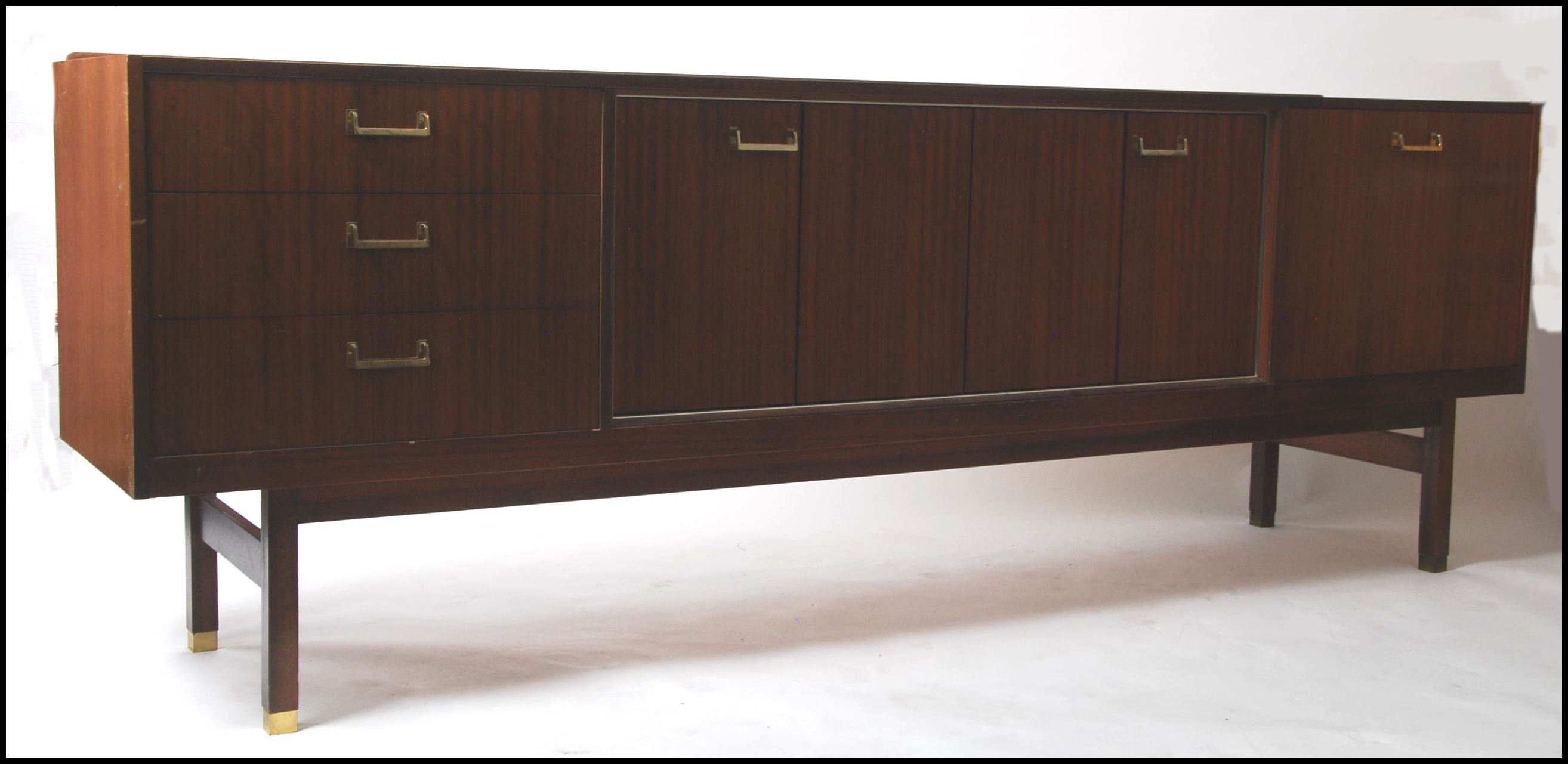 A 1970's low and long teak wood sideboard by G-Plan.