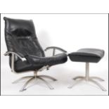 A 1970's retro Kebe of Denmark - Danish 20th century black leather reclining armchair on four