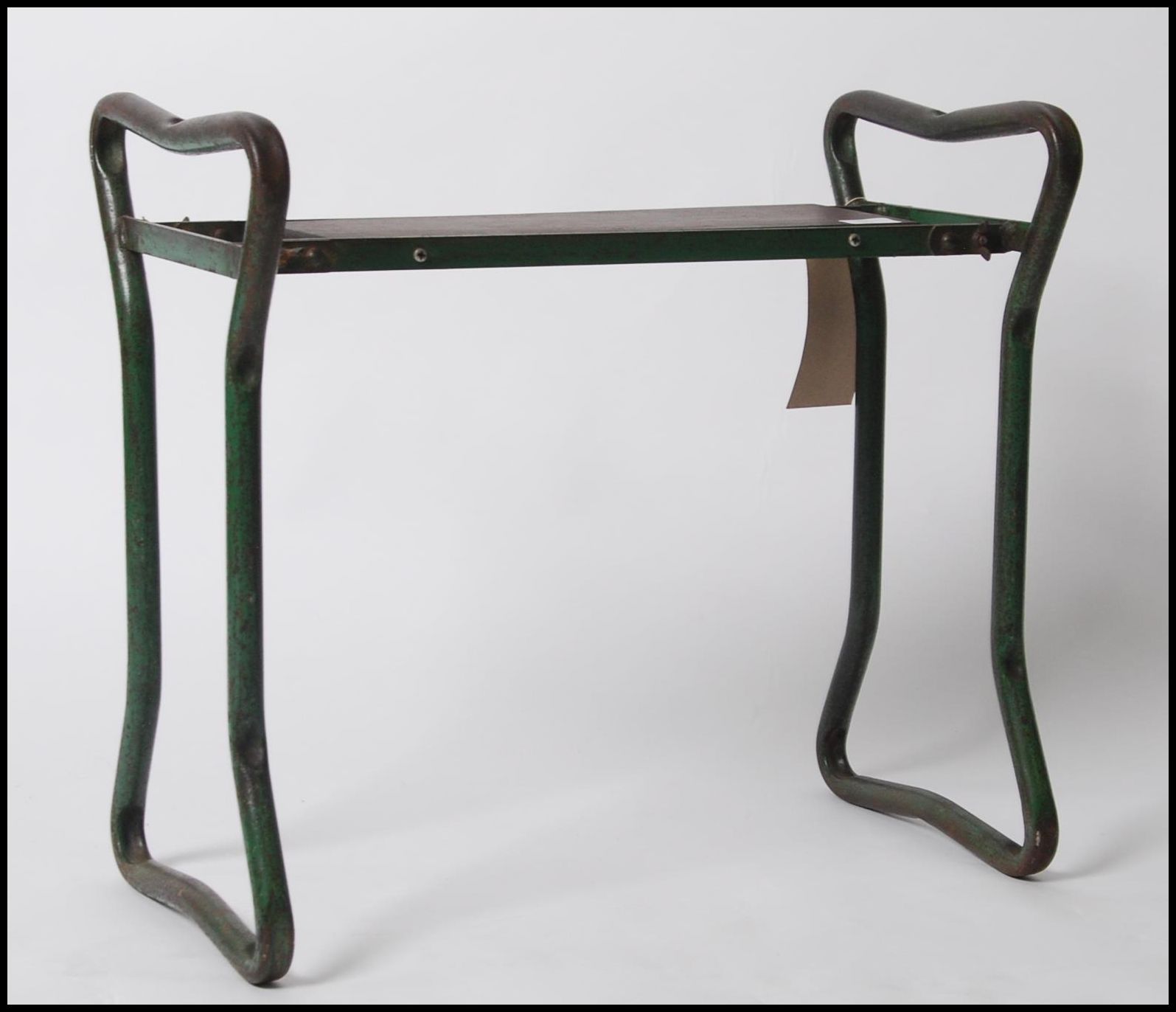 A vintage mid century 1950's tubular metal stool - bench seat having a polished pine plank seat -