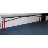 A 1950's retro formica and painted tubular metal large factory industrial refectory dining table.