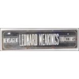 A Vintage early 20th century enamel industrial advertising sign for Leonard Meakings Newsagent &