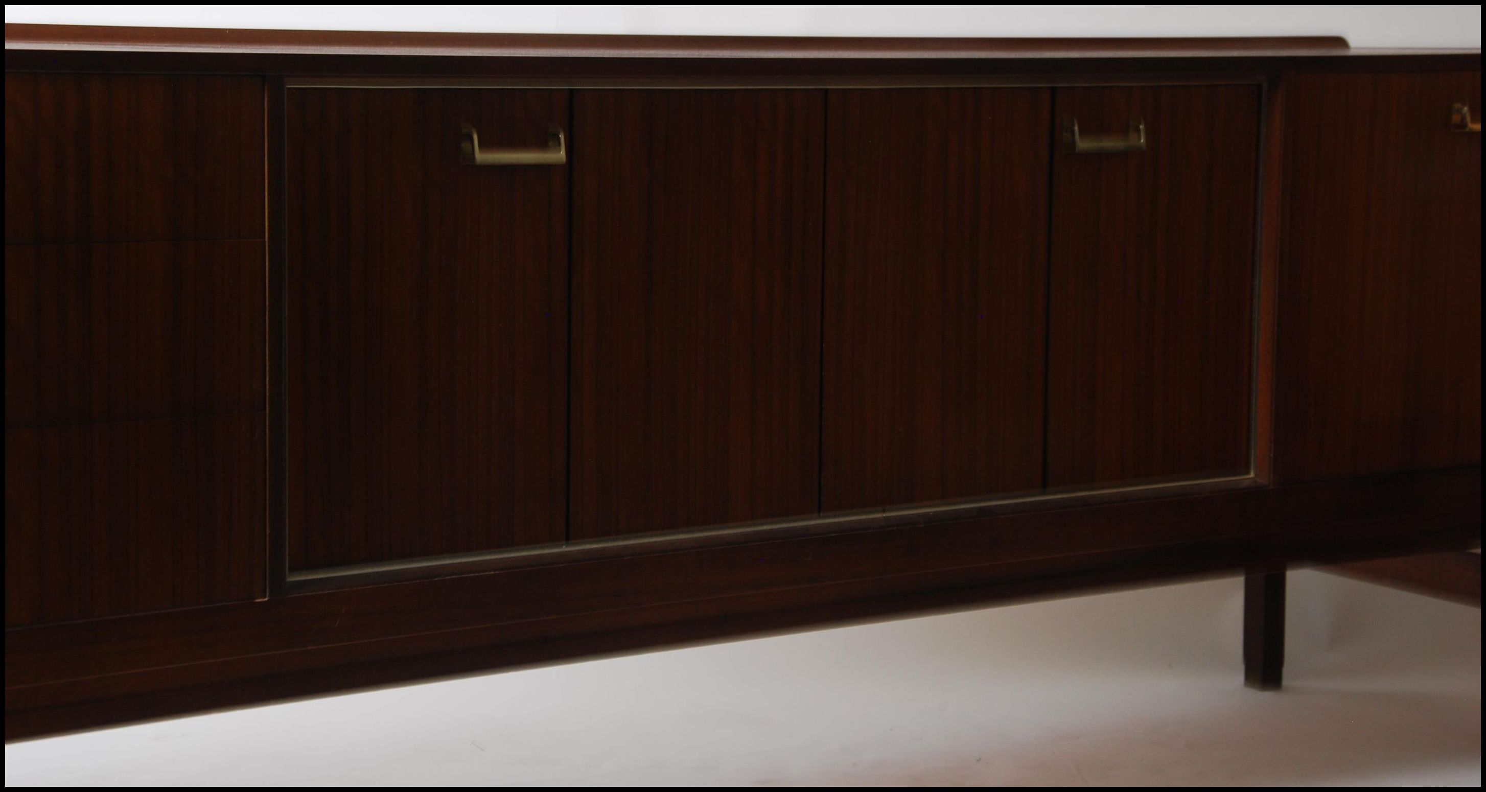 A 1970's low and long teak wood sideboard by G-Plan. - Image 4 of 7
