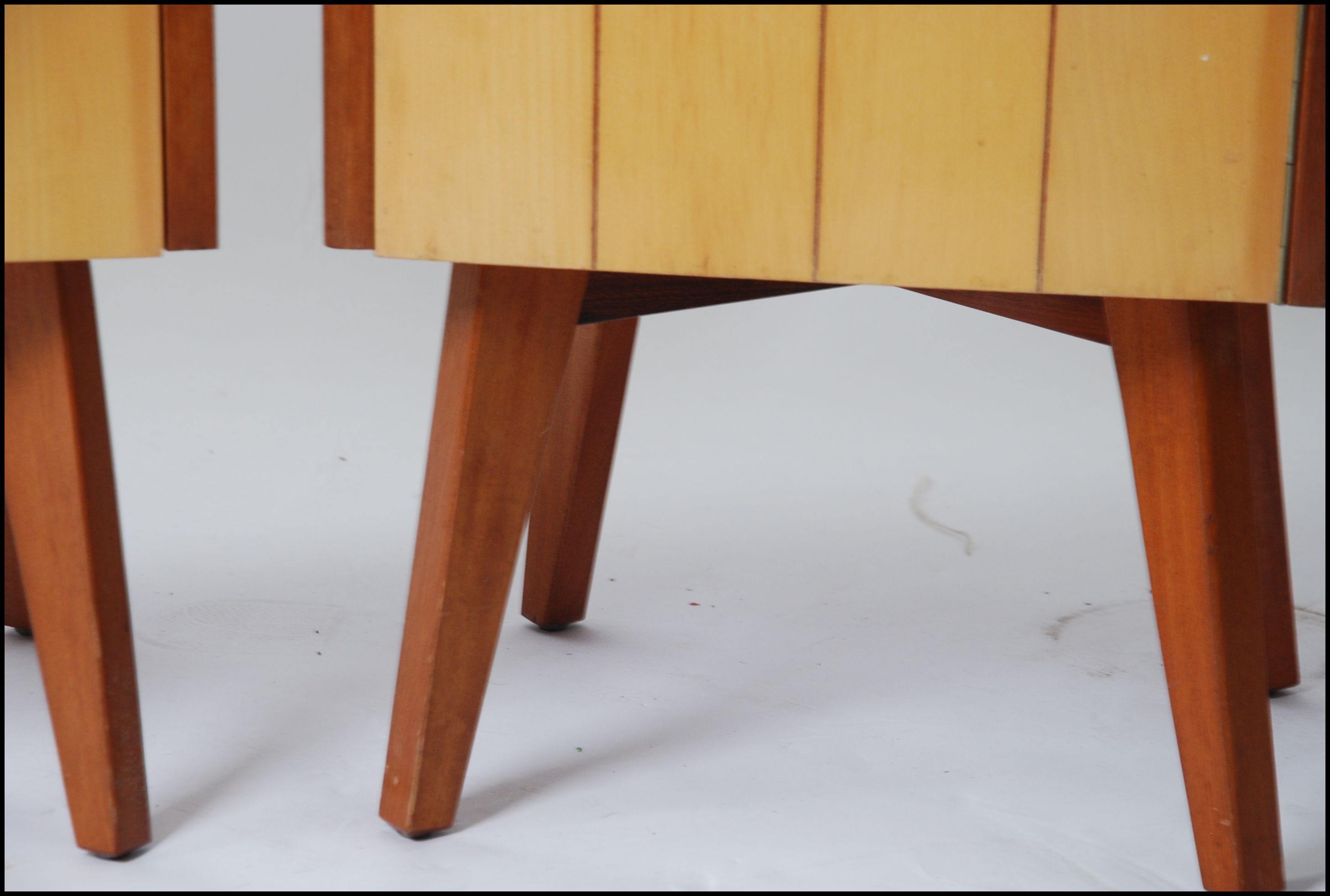 A pair of 1950's retro oak and maple wood bedside cabinets raised on square tapered legs with - Image 3 of 4