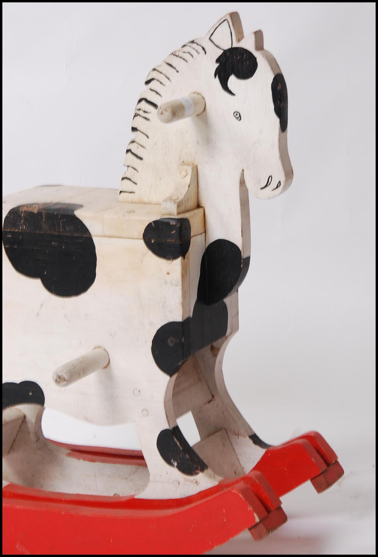 A 1950's unusual painted rocking horse of small proportions set over red painted wood glider rails - Image 3 of 5