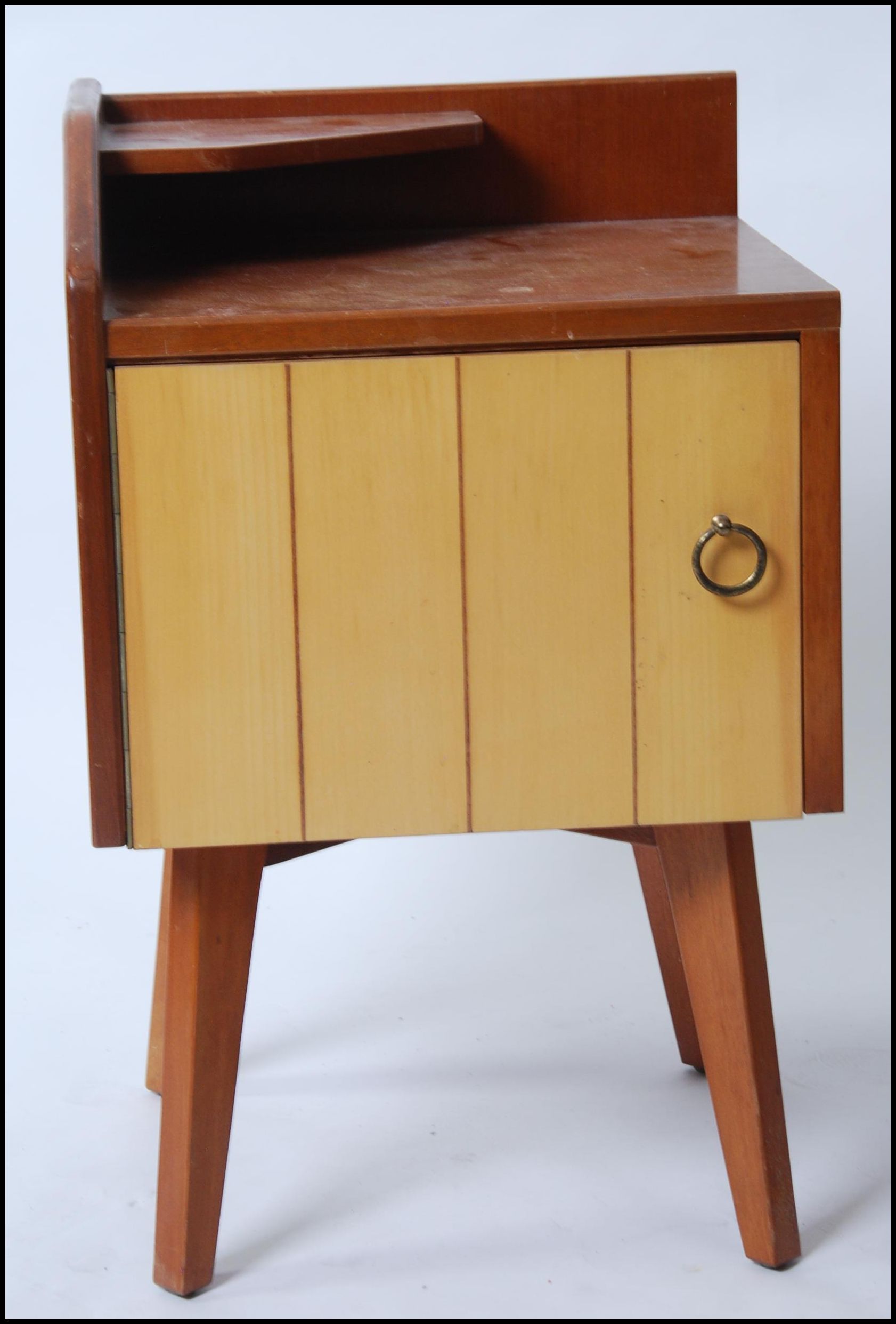 A pair of 1950's retro oak and maple wood bedside cabinets raised on square tapered legs with - Image 2 of 4