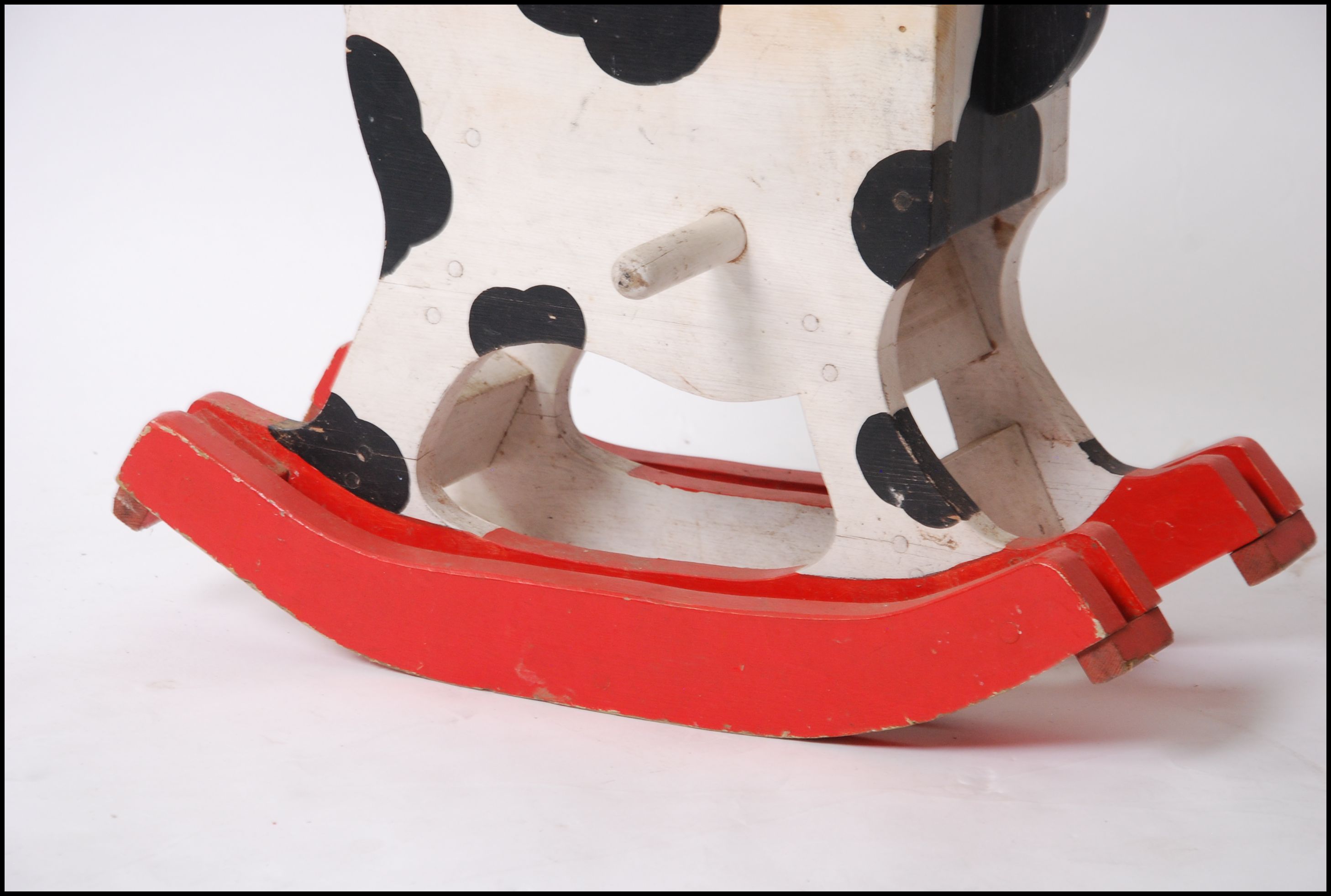 A 1950's unusual painted rocking horse of small proportions set over red painted wood glider rails - Image 5 of 5