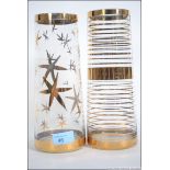 Two 1950's vintage glass vases one having gold banding the other having gold star decoration.