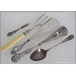 A collection of silver items to include rococo silver handled shoe horns, toasting fork,