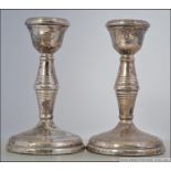 2 silver hallmarked stub candlesticks with ribbed decoration,