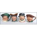 A collection of four large early ceramic Royal Doulton Toby Jug's.