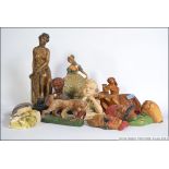 A collection of plaster figurines - masks dating from the 19th and 20th century to include