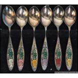 A cased set of 6 silver & enamel hallmarked spoons complete in the presentation box.