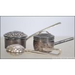 A pair of miniature silver hallmarked dolls house furniture lidded saucepans,
