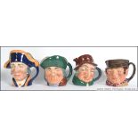 A collection of four large early ceramic Royal Doulton Toby Jug's.