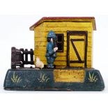 MONEY BOX: A vintage Victorian style 20th century cast iron hand painted automaton style money box