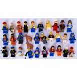 LEGO: A collection of 30x Lego minifigures (and 2x dogs) to include vintage, Indiana Jones,
