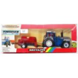 BRITAINS: An original vintage Britains Farm diecast model 9381 Ford Tractor With Spreader.