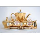 A Bavarian 20th century gilt lustre tea