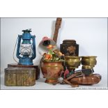 An interesting mixed lot to include lamps, tins, banjo, inlaid box,