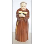 A Royal Worcester ' Monk ' Candle Snuffe