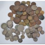 A collection of vintage coins dating from the 12th century to include several six pence coins,