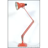 A 1940's Herbert Terry two step orange / red anglepoise Industrial desk lamp having square