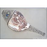 A Chinese Tibetan silver mounted conch shell.