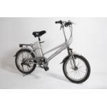 An electric bicycle with battery in silver by Headway having battery to upright with mudguards,