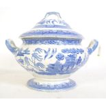 A 19th century blue and white twin handled bombe urn soup tureen of large form having underglaze