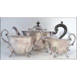 A silver plate 3 piece tea service comprising teapot,
