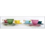 Four vintage Royal Stuart bone China trio's in different colours along with two other tea cups and