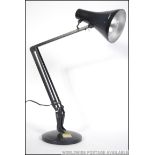 A vintage Herbert Terry post war anglepoise desk lamp in original black paint.