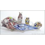 A collection of seven Murano retro glass fish of varying designs and shapes. Measures: 25cms high.